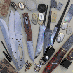 http://www.english-handmade-knives.co.uk/acatalog/Ad-Shot-Featuring-EnzoFolder.gif