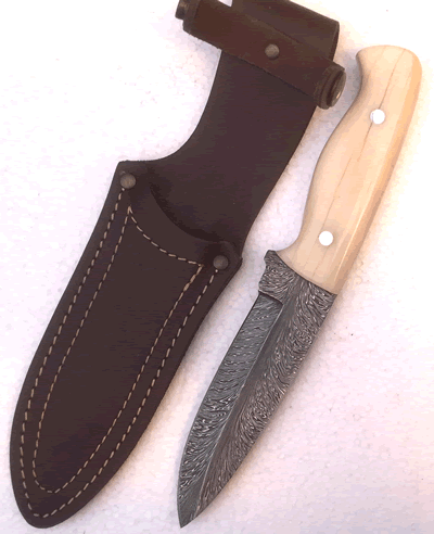 The Nordic Hunter Birds Feather Damascus and Stabilised Giraffe Bone Scales